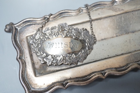A George V silver sauceboat, an Edwardian silver pen tray and three other items including shell butter dish, 18oz.